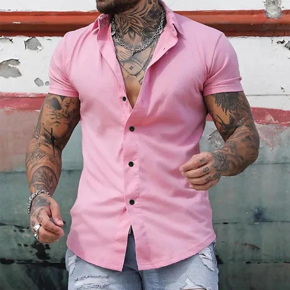Muscular man in a solid-color lapel short-sleeved shirt slim fit
